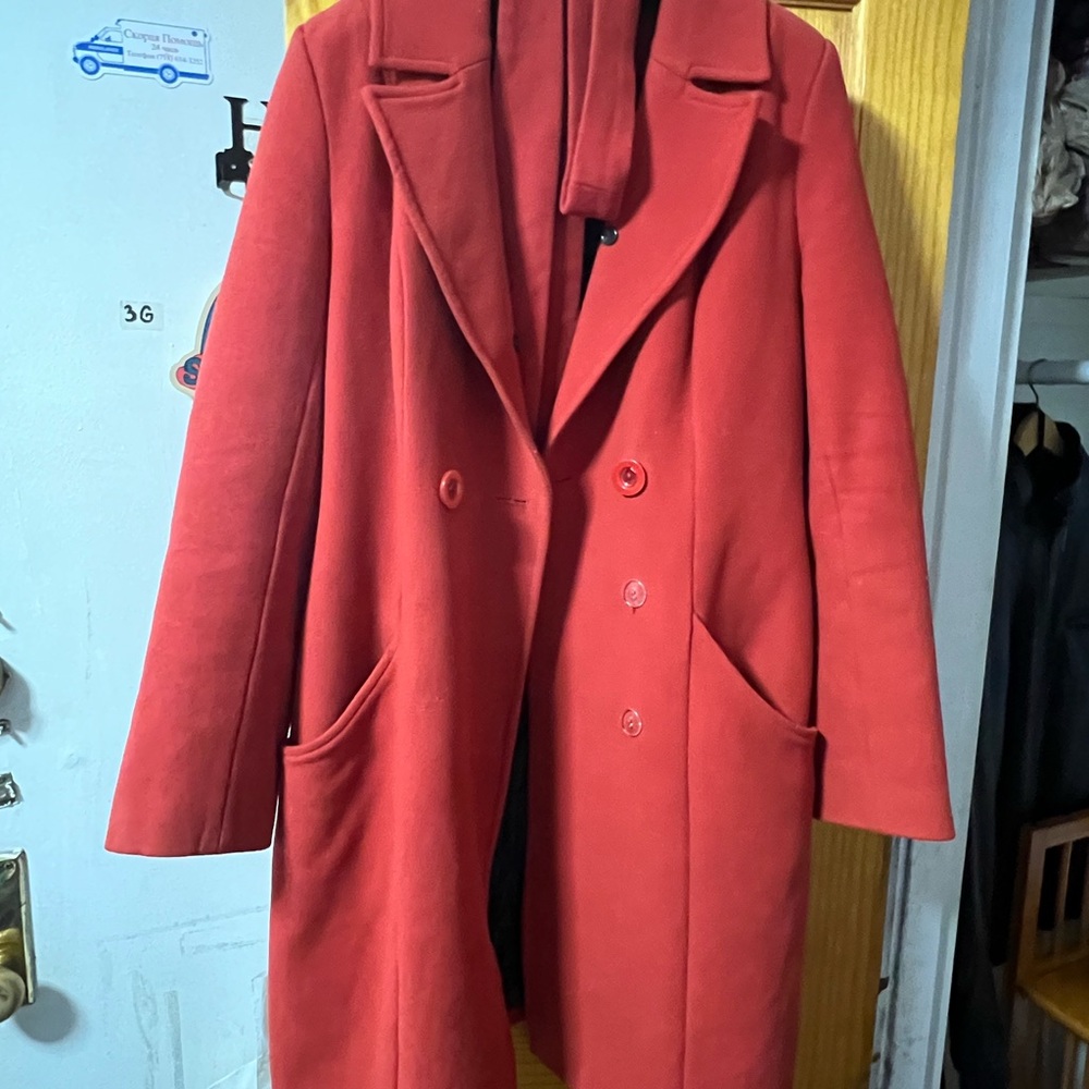 Warm winter cost wool. The coat has a new removable fox fur collar.